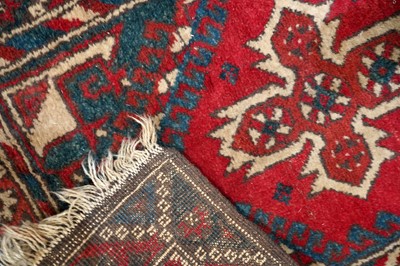 Lot 147 - A collection of hand-woven Turkish woollen prayer mats and a runner