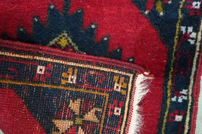 Lot 147 - A collection of hand-woven Turkish woollen prayer mats and a runner