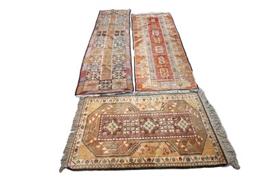 Lot 108 - A collection of two Kazakh runners and a rug
