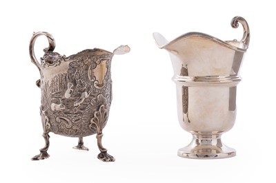 Lot 49 - A late Victorian silver cream jug; and a modern silver cream jug