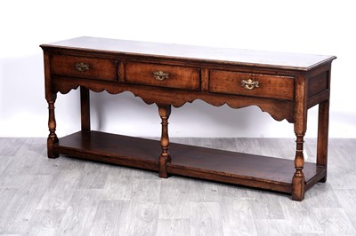 Lot 6 - N. H. Chapman & Co Ltd: a ‘Siesta’ oak and elm sideboard
