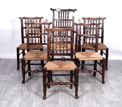 Lot 16 - A set of six Georgian-style country oak dining chairs