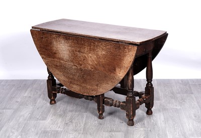 Lot 10 - An 18th Century oak gateleg table