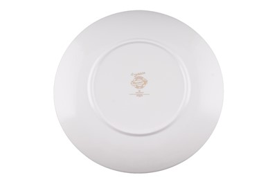 Lot 243 - A boxed Wedgwood ‘Clarice Cliff Bizarre Centenary’ charger; and three plates