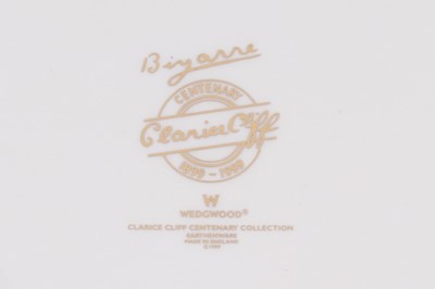 Lot 243 - A boxed Wedgwood ‘Clarice Cliff Bizarre Centenary’ charger; and three plates
