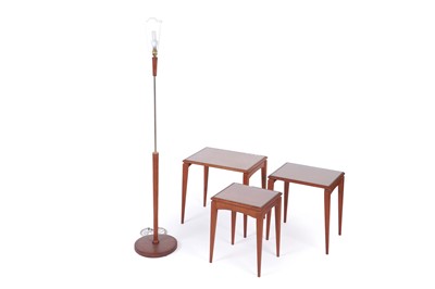 Lot 33 - A teak nest of three tables; and a teak and brass standard lamp