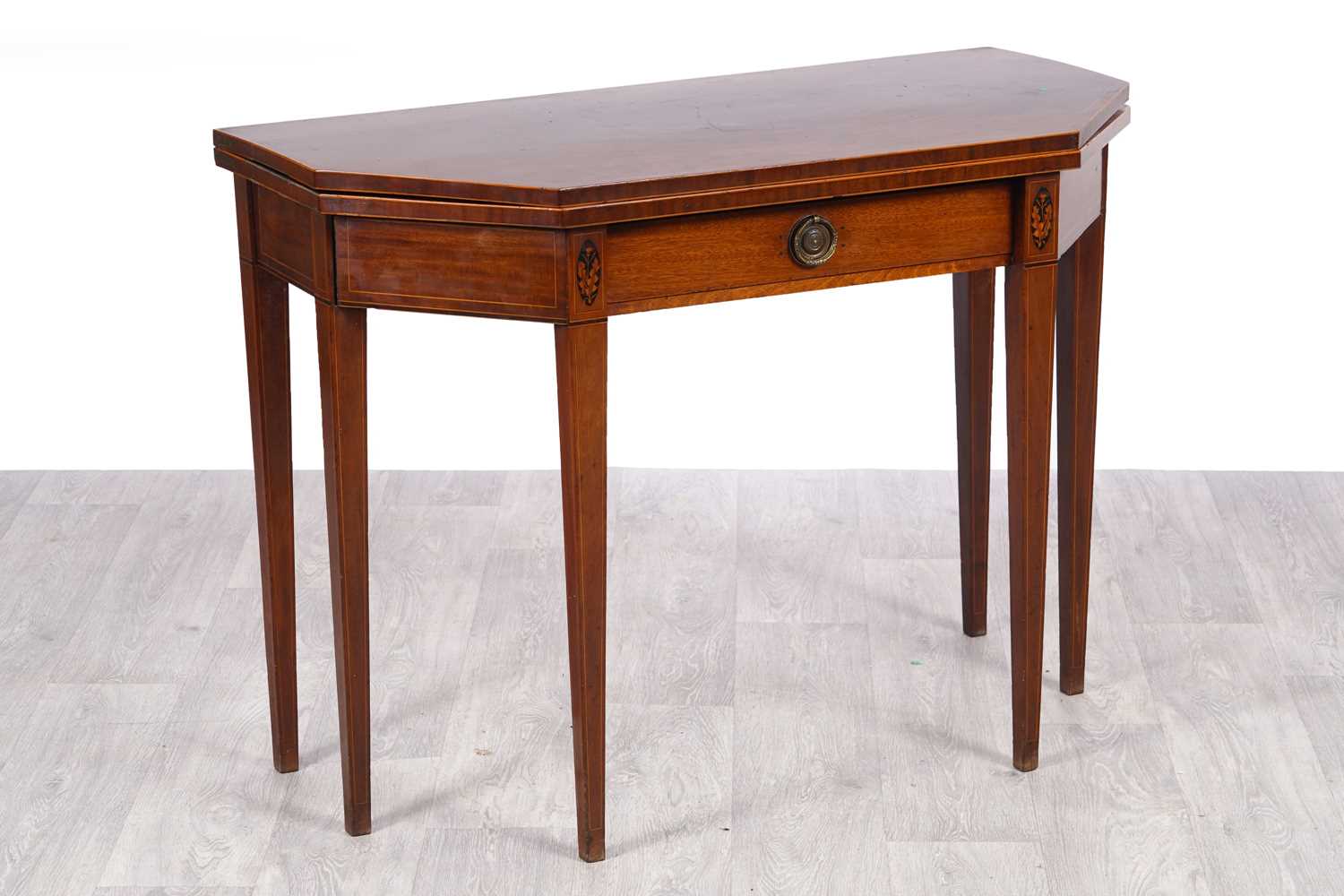 Lot 23 - A George III mahogany tea table