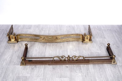 Lot 169 - Two brass fenders