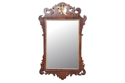 Lot 100 - A Georgian mahogany fret-carved wall mirror