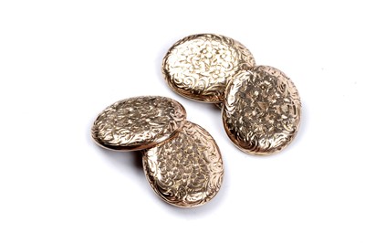 Lot 68 - A pair of Edwardian gold cuff links with engraved floral decoration