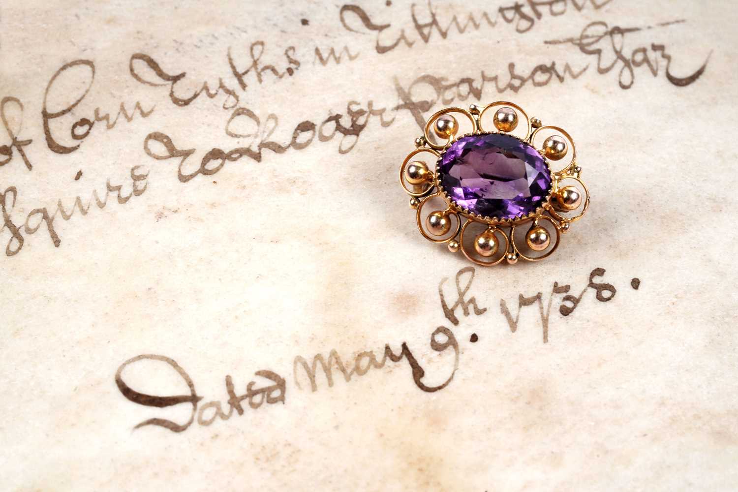 Lot 69 - An Edwardian amethyst brooch