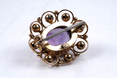 Lot 69 - An Edwardian amethyst brooch