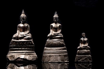 Lot 377 - Three Thai silver foil Buddhas