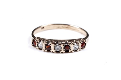 Lot 36 - A white spinel and tourmaline ring, on 9ct; and a Mexican synthetic colour-change sapphire ring