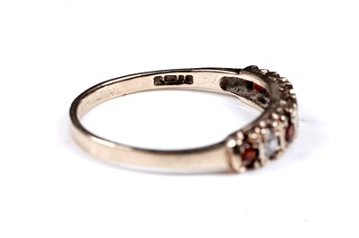 Lot 36 - A white spinel and tourmaline ring, on 9ct; and a Mexican synthetic colour-change sapphire ring