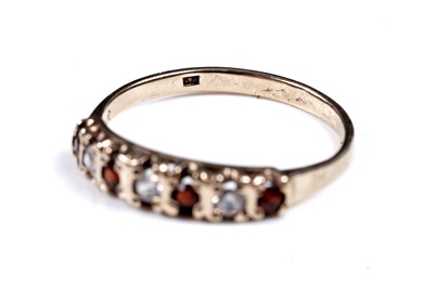 Lot 36 - A white spinel and tourmaline ring, on 9ct; and a Mexican synthetic colour-change sapphire ring