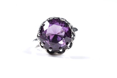 Lot 36 - A white spinel and tourmaline ring, on 9ct; and a Mexican synthetic colour-change sapphire ring