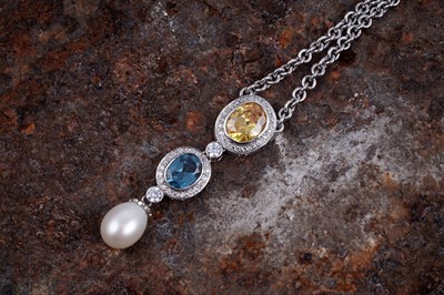 Lot 542 - A gemstone, diamond and pearl pendant on chain