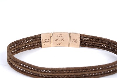 Lot 100 - A 19th Century French hairwork bracelet