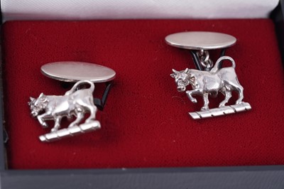 Lot 37 - 20th Century silver cuff links; and a signet ring