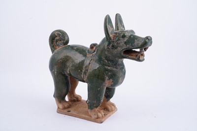 Lot 307 - A Chinese Han Dynasty-style green-glazed pottery dog