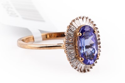 Lot 412 - A contemporary tanzanite and diamond ring