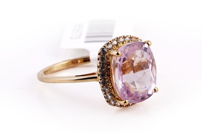 Lot 413 - A contemporary kunzite and Cambodian white zircon ring
