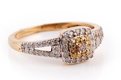 Lot 416 - A yellow and white diamond cluster ring