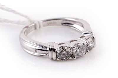 Lot 417 - A contemporary three-stone diamond ring