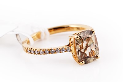 Lot 420 - A contemporary Iliana green turkizite and diamond ring