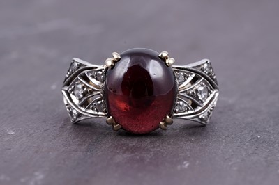 Lot 546 - A late 19th Century Belle Époque garnet and diamond ring