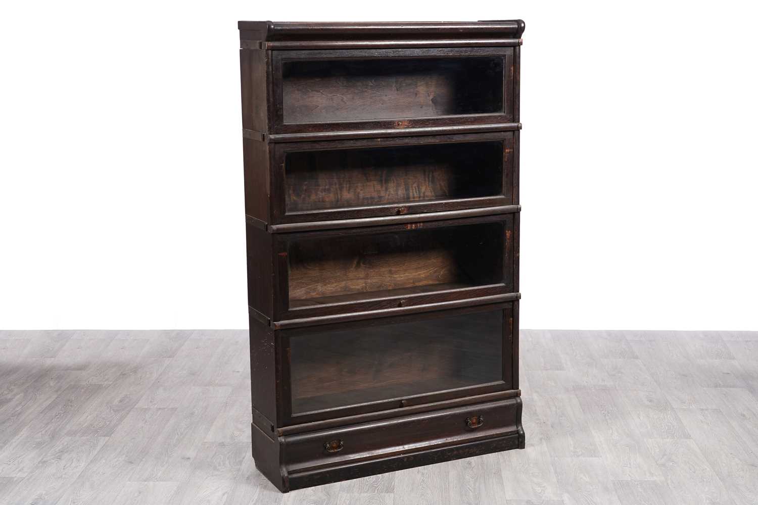 Lot 3 - An oak sectional bookcase