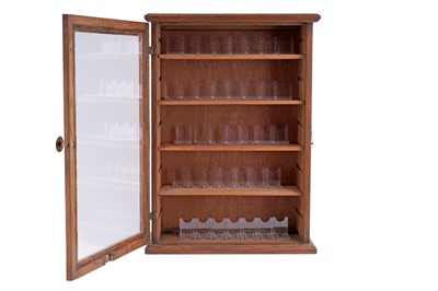 Lot 95 - An Edwardian oak wall hanging display cabinet