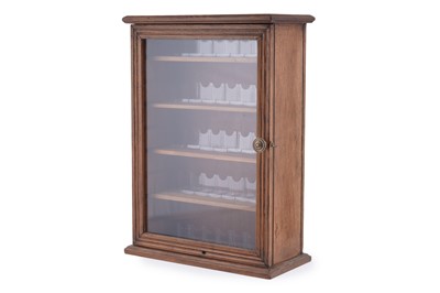 Lot 95 - An Edwardian oak wall hanging display cabinet