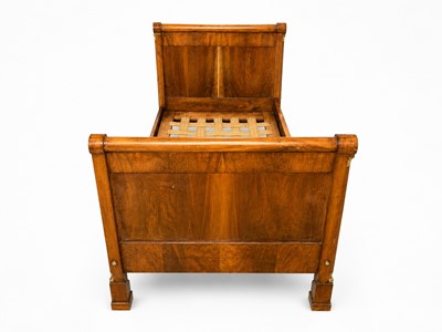 Lot 19 - A late 19th Century continental empire-style single bed