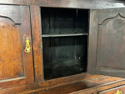 Lot 47 - A Georgian Welsh oak cupboard or deuddarn