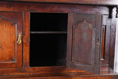 Lot 47 - A Georgian Welsh oak cupboard or deuddarn