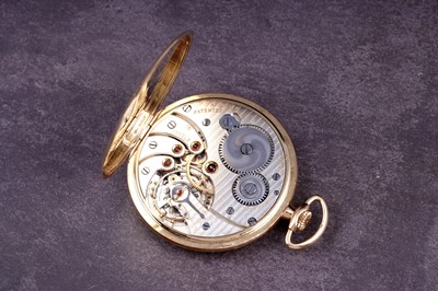 Lot 434 - A 1920's 18ct gold-cased open-faced keyless-wind pocket watch