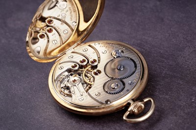 Lot 434 - A 1920's 18ct gold-cased open-faced keyless-wind pocket watch