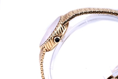 Lot 419 - Longines: an 18ct yellow gold lady's manual wind cocktail watch