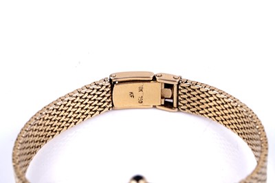 Lot 419 - Longines: an 18ct yellow gold lady's manual wind cocktail watch