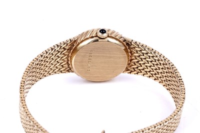 Lot 419 - Longines: an 18ct yellow gold lady's manual wind cocktail watch