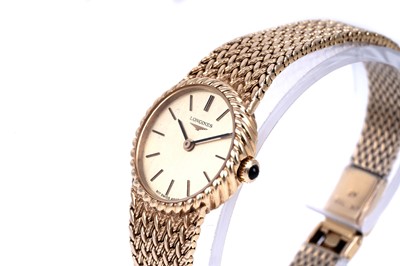 Lot 419 - Longines: an 18ct yellow gold lady's manual wind cocktail watch