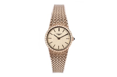 Lot 419 - Longines: an 18ct yellow gold lady's manual wind cocktail watch