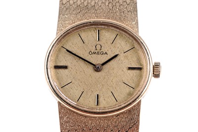 Lot 413 - Omega: a lady's 18ct yellow gold cased manual wind cocktail watch