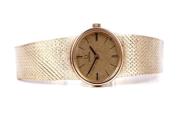 Lot 413 - Omega: a lady's 18ct yellow gold cased manual wind cocktail watch