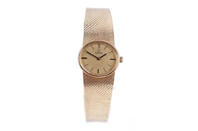 Lot 413 - Omega: a lady's 18ct yellow gold cased manual wind cocktail watch