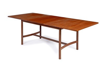 Lot 5 - A teak extending dining table
