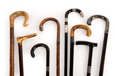 Lot 356 - A collection of walking sticks and canes