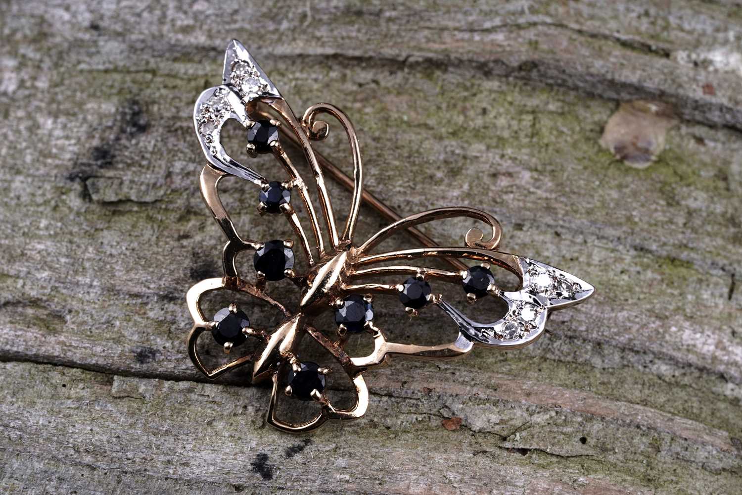 Lot 4 - A 20th Century Modern sapphire and diamond butterfly pattern brooch